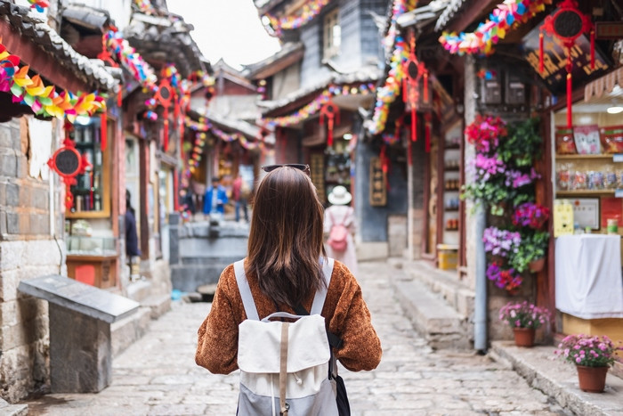 young-woman-traveler-walking-lijiang-old-town-china-travel-lifestyle-concept (Copy).jpg